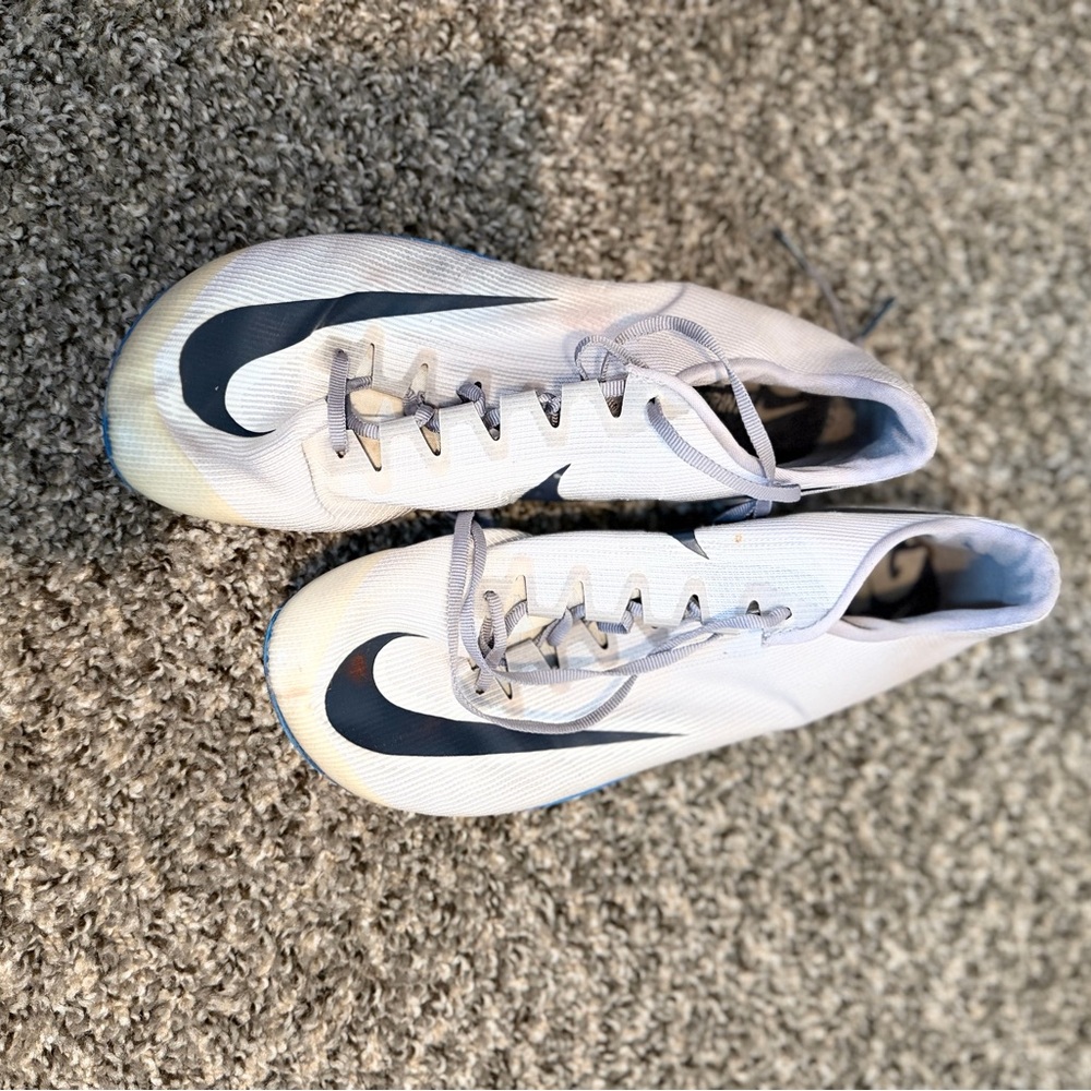 Track and Field. 
Nike White and Dark Blue Track Shoes.